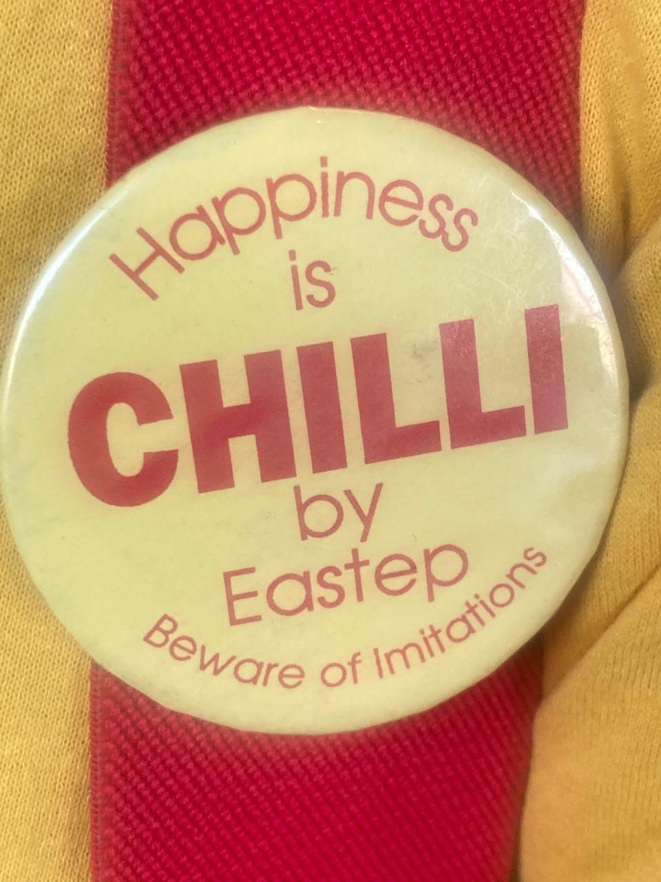 Les Eastep of Springfield wears this button on his suspenders Sunday at the Illinois State Fair Chili Cookoff at The Shed. Eastep said he prefers the spelling "chilli." His history of the dish in Springfield was published in 2013.