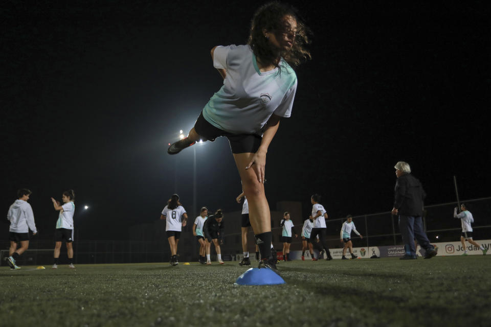 Players of the Orthodox Club'b's women's team practice in Amman, Jordan, Saturday, Oct. 22, 2022. Women's soccer has been long been neglected in the Middle East, a region that is mad for the men's game and hosts the World Cup for the first time this month in Qatar. (AP Photo/Raad AL-Adayleh)