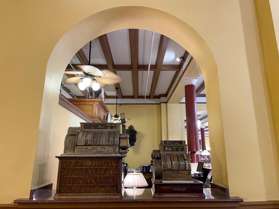 Two old cash registers are on display in Hotel Colorado's lobby.