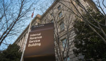 FILE - This April 13, 2014, file photo shows the Internal Revenue Service (IRS) headquarters building in Washington. On Friday, Feb. 4, 2022, The Associated Press reported on stories circulating online incorrectly claiming The IRS will issue a fourth round of stimulus checks to Americans in February 2022. (AP Photo/J. David Ake, File)