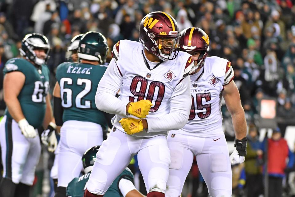 Washington Commanders defensive end Montez Sweat (90) celebrates after a sack against the Philadelphia Eagles during the fourth quarter at Lincoln Financial Field.