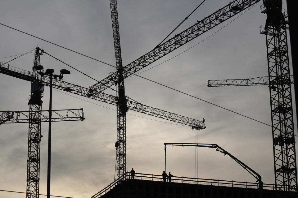 Construction specialists work on the site of the new headquarters of Germany's intelligence agency Bundesnachrichtendienst (BND) in Berlin March 24, 2010. The BND's new headquarters will feature a visitor centre and be surrounded by see-through fencing, striking a contrast with the high walls at its current home in the village of Pullach, near Munich.     REUTERS/Tobias Schwarz     (GERMANY - Tags: CITYSCAPE BUSINESS CONSTRUCTION POLITICS)