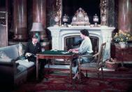 <p>King George VI and Queen Elizabeth relax in their apartment in Buckingham Palace on their 25th wedding anniversary.</p>