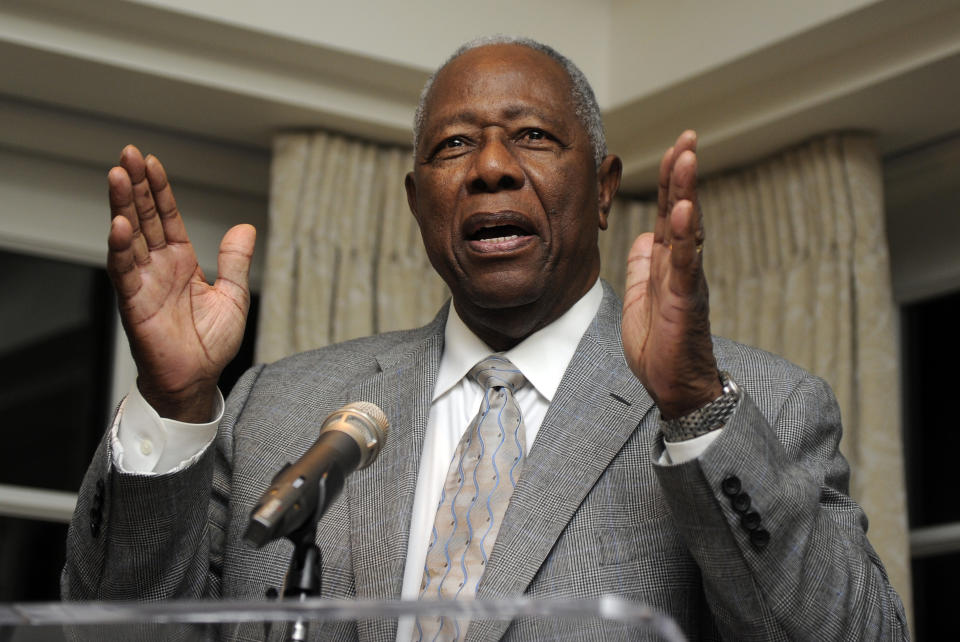 Baseball Hall of Famer Hank Aaron speaks at a reception in his honor, Friday, Feb. 7, 2014, in Washington. Aaron is turning 80 and is being celebrated with a series of events in Washington. (AP Photo/Nick Wass)