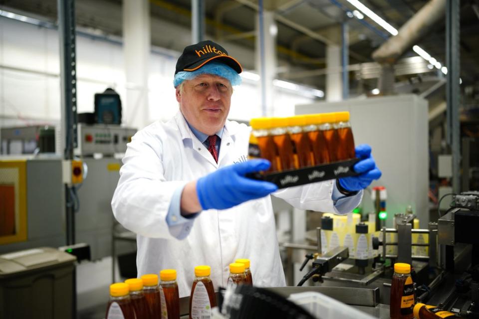 Prime Minister Boris Johnson during a visit to Hilltop Honey in Newtown, Powys (Ben Birchall/PA) (PA Wire)