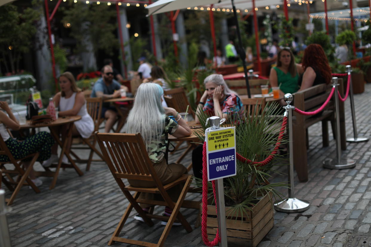 People enjoy a meal out in Covent Garden, London. The �Eat Out to Help Out' scheme will give diners a half-price discount on meals during the whole month of August, as the Government aims at boosting restaurant and pub trade following the lockdown. Picture date: Friday August 7, 2020.