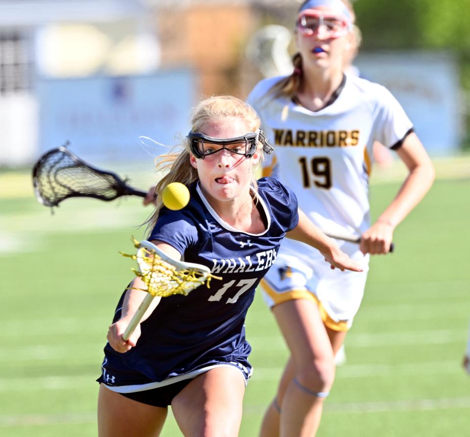 Bailey Lower reaches for the ball ahead of Nantucket ahead of Julia Kipperman of Nauset
(Photo: Ron Schloerb/Cape Cod Times)