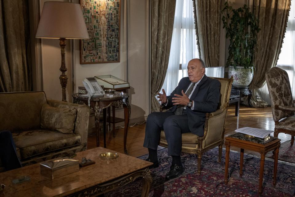 Egyptian Foreign Minister Sameh Shukry speaks during an interview with The Associated Press at his office, in Cairo, Egypt, Sunday, June 21, 2020. Egypt wants the United Nations Security Council to "undertake its responsibilities" and prevent Ethiopia from starting to fill its massive, newly built hydroelectric dam on the Nile River next month amid a breakdown in negotiations, Shukry told the AP on Sunday, accusing Ethiopian officials of stoking antagonism between the countries.(AP Photo/Nariman El-Mofty)