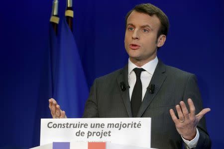 Former French minister Emmanuel Macron, head of the political movement En Marche !, or Forward !, and candidate for the 2017 French presidential election, attends a news conference at his campaign headquarters in Paris, France, January 19, 2017. REUTERS/Philippe Wojazer