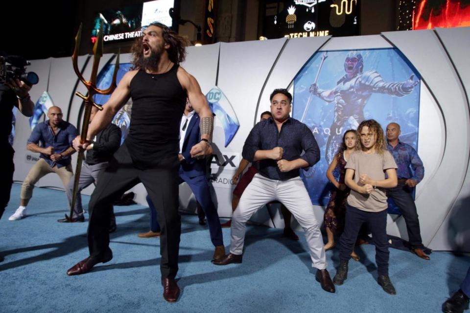 Upstaged: Jason Momoa with his children performing the traditional routine (Rex Features)