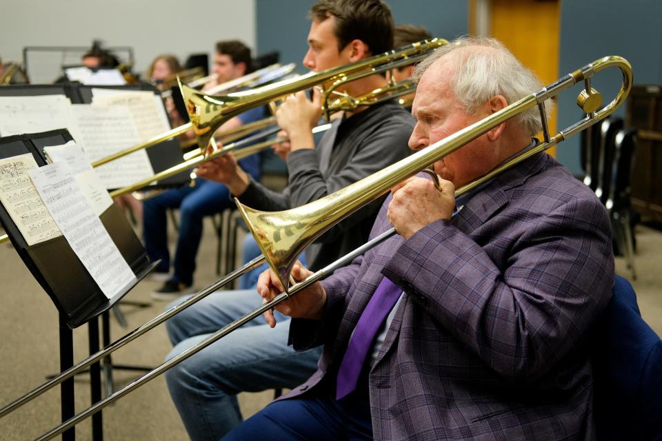 Longtime University of Oklahoma trombone professor Irvin Wagner performs with the OU Trombone Choir during a rehearsal inside OU's Catlett Music Center in Norman on March 22, 2022.