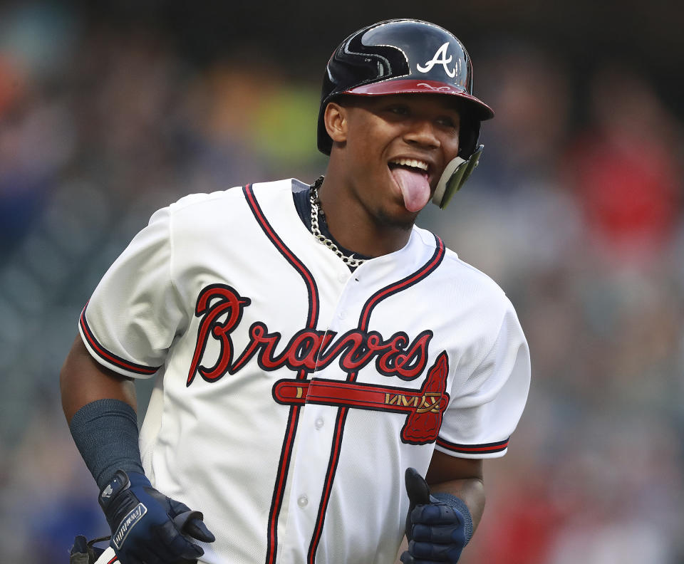 Atlanta Braves' Ronald Acuna Jr. celebrates while rounding the bases after hitting a lead-off home run in the first inning of a baseball game against the Miami Marlins Tuesday, Aug. 14, 2018 in Atlanta. (Curtis Compton/Atlanta Journal-Constitution via AP)