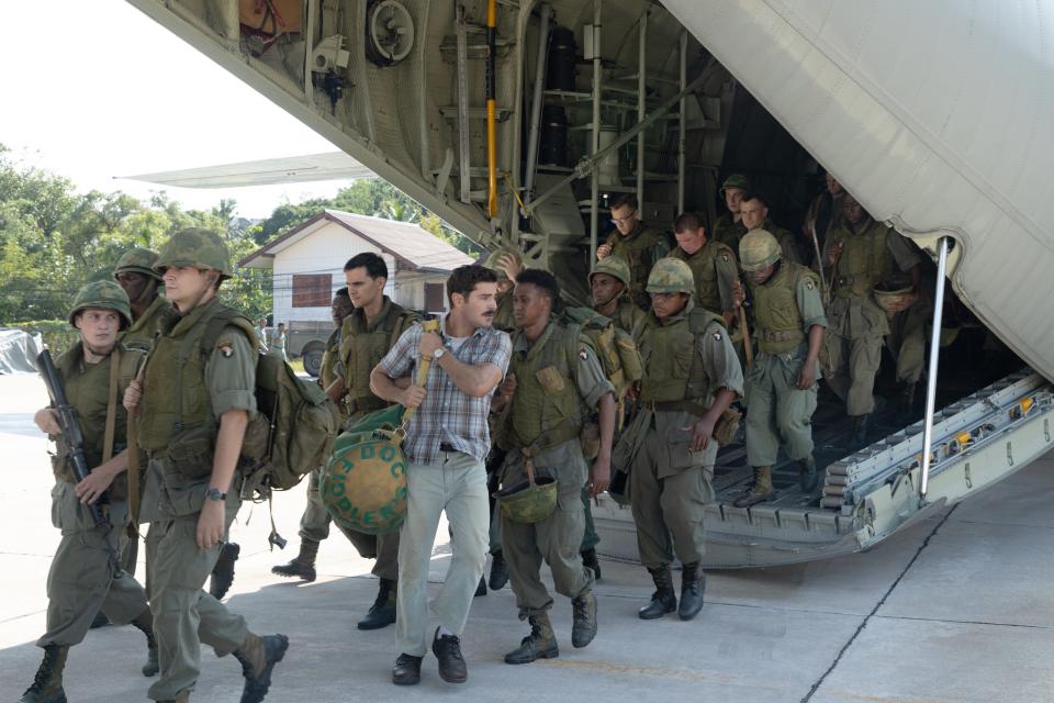 Zac Efron, center, lands in Vietnam in 1967 to bring some of his buddies serving in the conflict a taste of home in "The Greatest Beer Run Ever."