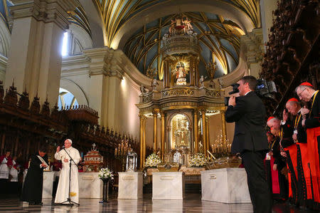 Pope Francis blesses after praying in front of Peruvian Saints relics at the Cathedral San Juan Apostol y Evangelista in Lima, Peru, January 21, 2018. REUTERS/Alessandro Bianchi