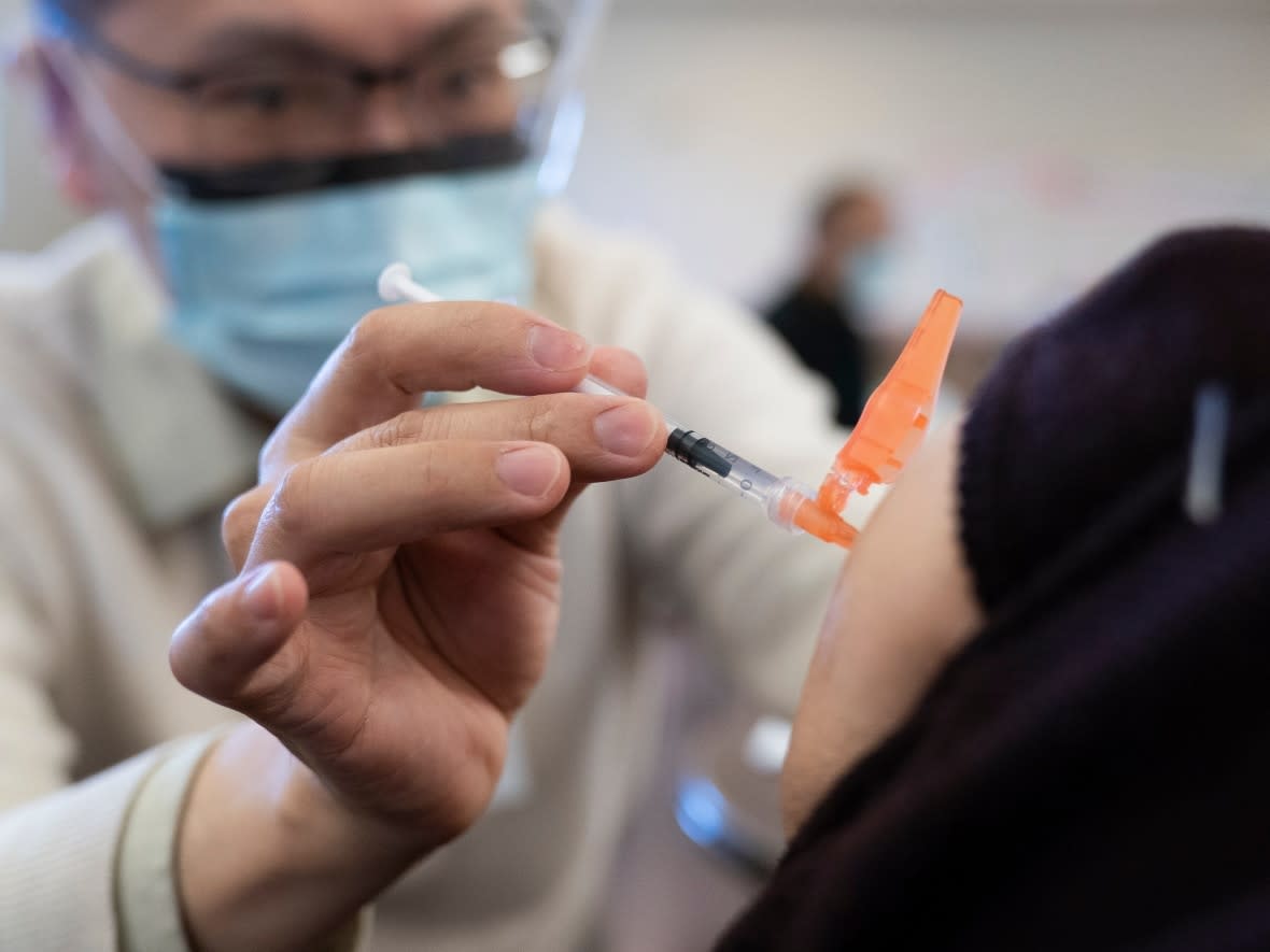 Concern about the danger posed by COVID has been waning in New Brunswick. Fewer than 10 per cent of adults under the age of 60 have had a booster vaccine within the last five months. (Jonathan Hayward/The Canadian Press - image credit)