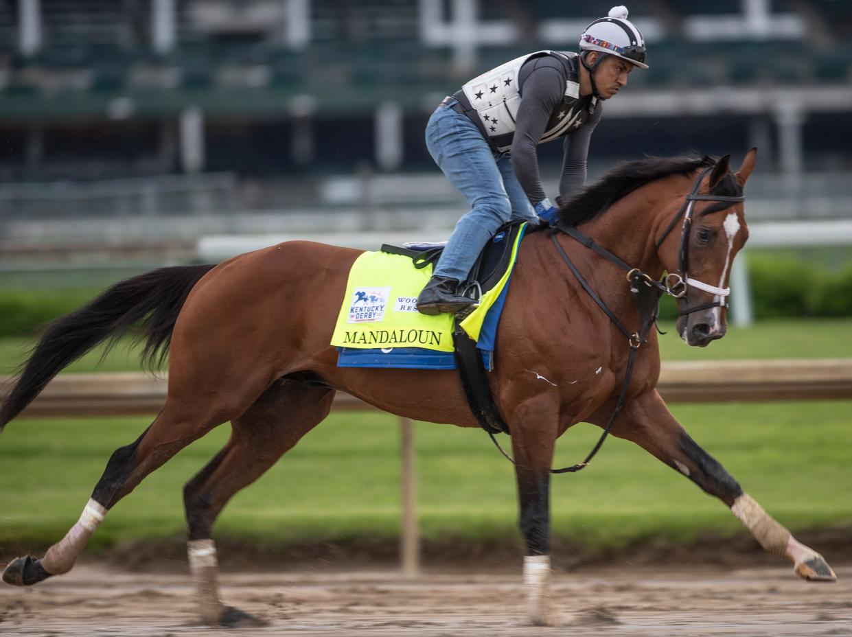 Kentucky Derby entrant Mandaloun gallops in the morning at Churchill Downs.  Mandaloun is trained by Brad Cox. April 29, 2020