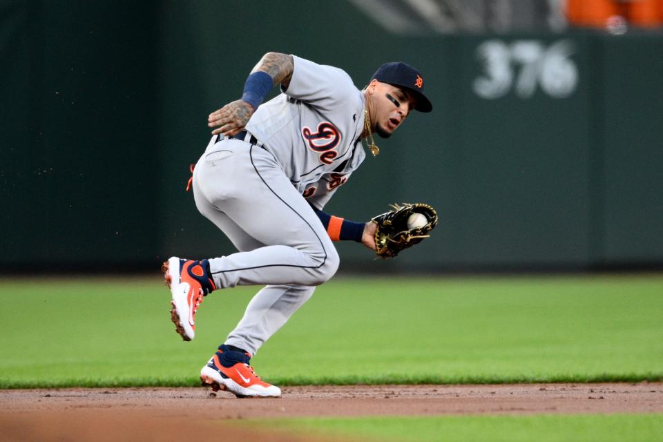 Tigers shortstop Javier Baez fields a ball hit by Orioles first baseman Ryan Mountcastle during the first inning on Friday, April 21, 2023, in Baltimore.