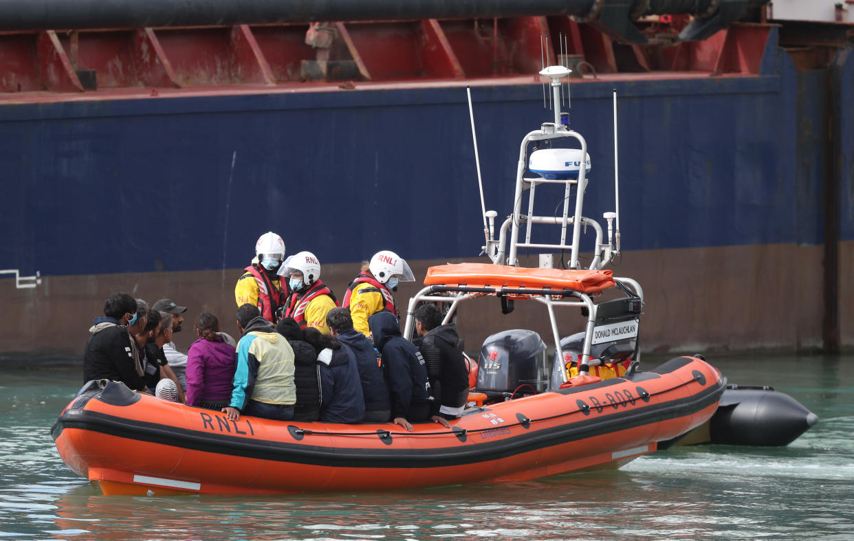 A group of people thought to be migrants are brought into Dover, Kent, by the RNLI following a small boat incident in the Channel. (Photo by Andrew Matthews/PA Images via Getty Images)