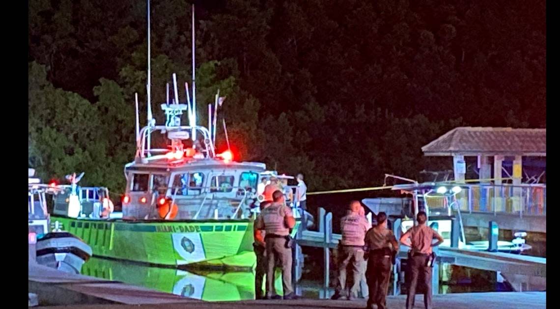 A Miami-Dade County Fire Rescue boat pulls into a slip at Black Point Marina Sunday night, Sept. 4, 2022. The boat brought to shore several people injured in a boating crash earlier that night.
