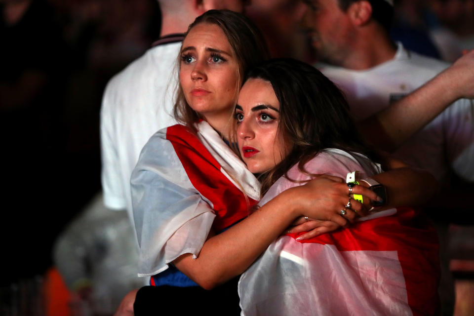 England fans are dejected after England lose the game on penalties at Vinegar Yard, London as they watch the UEFA Euro 2020 Final between Italy and England. Picture date: Sunday July 11, 2021.