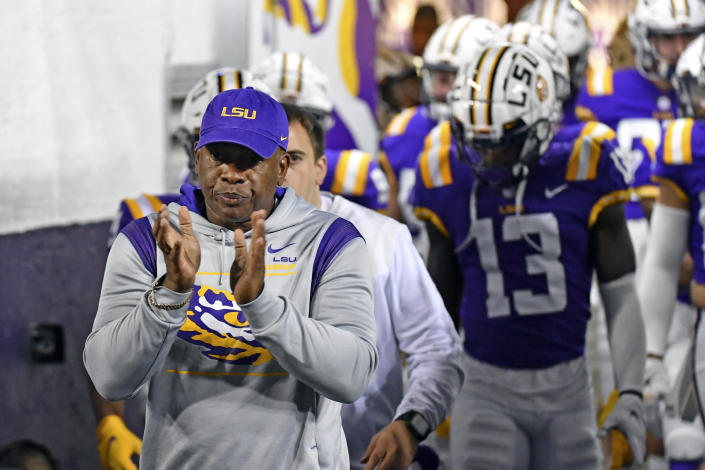 LSU wide receivers coach Mickey Joseph leads players onto the field before an NCAA college football game against Louisiana-Monroe, on Saturday, Nov. 20, 2021, at Tiger Stadium in Baton Rouge, La. Joseph, who coached wide receivers the last five seasons at LSU, will return to Nebraska as receivers coach, passing game coordinator and associate head coach under Scott Frost. (Hilary Scheinuk/The Advocate via AP)