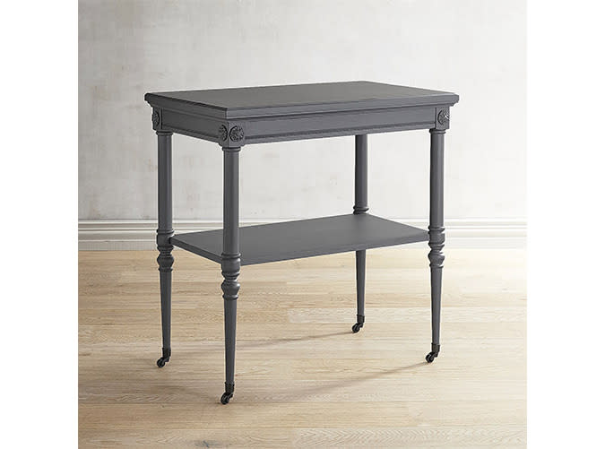 <p>Our new favorite nightstand/bar cart/side table/you name it.</p> <p><a rel="nofollow noopener" href="http://www.pier1.com/magnolia-home-petite-rosette-gray-accent-table/3261043.html?" target="_blank" data-ylk="slk:Petite Rosette Gray Accent Table;elm:context_link;itc:0;sec:content-canvas" class="link "><em>Petite Rosette Gray Accent Table </em></a><em>($350)</em></p>