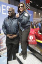 Christine Buffy, front right, president of Carnival Cruise Line's introduces the first roller coaster that will be on a cruise ship with former NBA star and Carnival's chief fun officer, Shaquille O'Neal during the International Association of Amusement Parks and Attractions convention Tuesday, Nov. 19, 2019, in Orlando, Fla. (AP Photo/John Raoux)