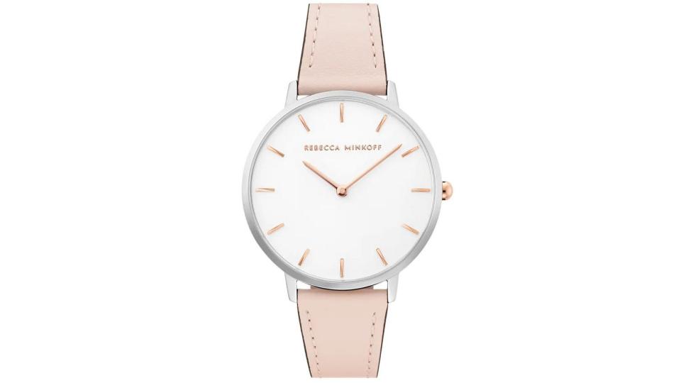 This classic wrist watch is elevated with an always-on-trend blush hue.