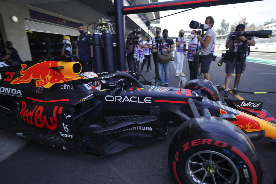 Red Bull driver Max Verstappen, of The Netherlands, drives his car out of the pits during a practice run of the Formula One Mexico Grand Prix auto race at the Hermanos Rodriguez racetrack in Mexico City, Saturday, Nov. 6, 2021. (AP Photo/Fernando Llano)