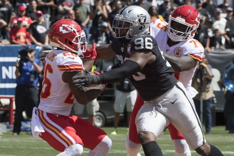 Defensive end Clelin Ferrell (C) entered the league as the No. 4 overall pick by the Oakland Raiders in the 2019 NFL Draft. File Photo by Terry Schmitt/UPI