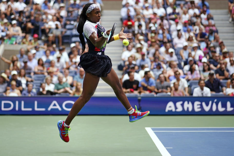 Coco Gauff, of the United States, returns against Shuai Zhang, of China, during the fourth round of the U.S. Open tennis championships, Sunday, Sept. 4, 2022, in New York. (AP Photo/Eduardo Munoz Alvarez)