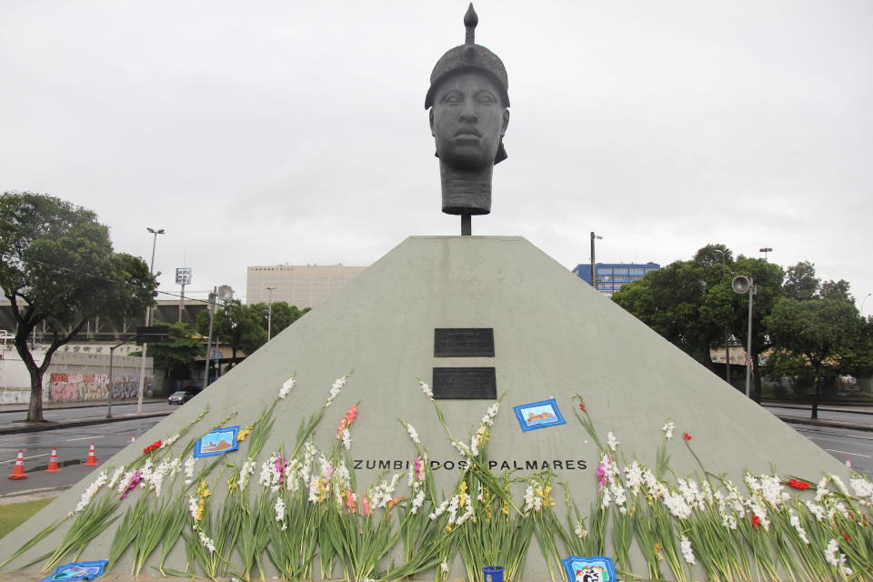 A statue of Zumbi dos Palmares in Rio de Janeiro is adorned with flowers on Nov. 20, 2018 for Black Consciousness Day.