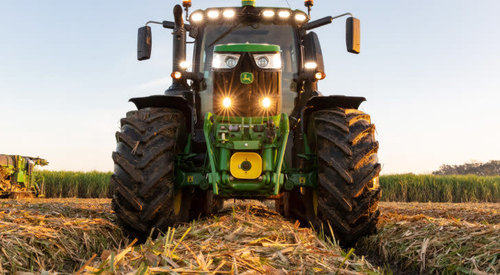 Deere equipment in harvested field