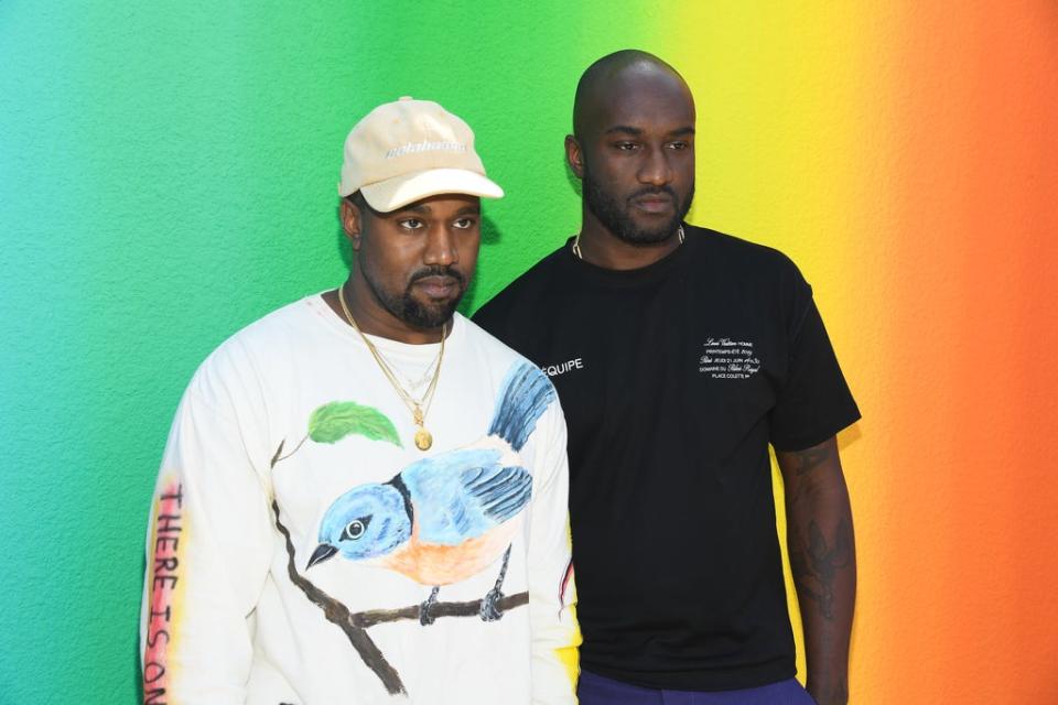 Virgil Abloh (right) with Kanye West at Paris Fashion Week 2019 (Getty Images)
