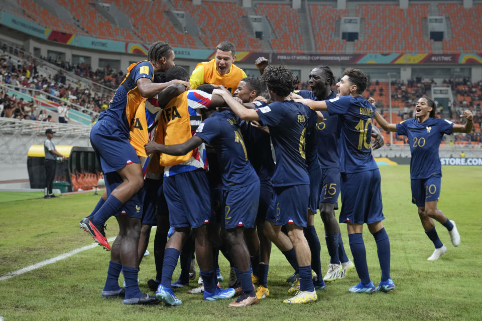 Team France celebrates after scoring a goal against the U.S. in their FIFA U-17 World Cup Group E soccer match at Jakarta International Stadium in Jakarta, Indonesia, Saturday, Nov. 18, 2023. (AP Photo/Achmad Ibrahim)