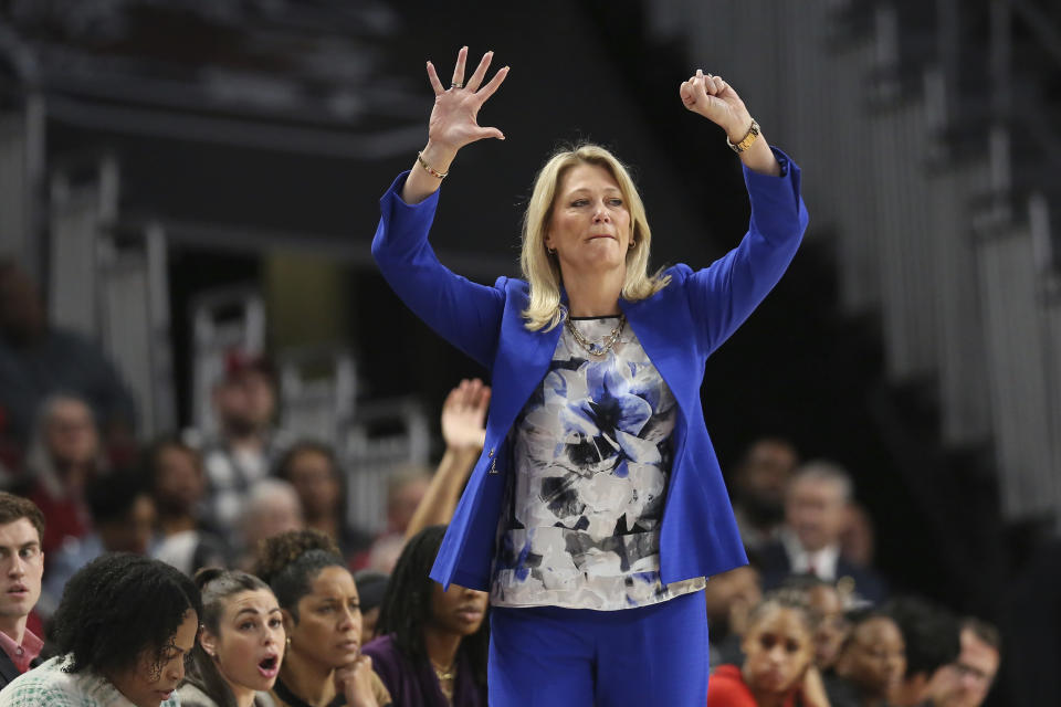 Georgia head coach Katie Abrahamson-Henderson calls out an offensive set during the first half of an NCAA college basketball game against South Carolina, Sunday, Feb. 18, 2024, in Columbia, S.C. (AP Photo/Artie Walker Jr.)