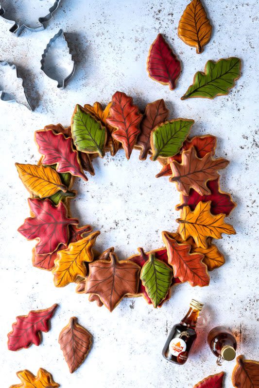 <p>Domestic Gothess</p><p>Kids of any age can help cut out leaf shapes from colored sugar cookie dough to make these delicious, tiny wreaths. Follow <a href="https://domesticgothess.com/blog/2019/09/04/maple-cookie-wreath/" rel="nofollow noopener" target="_blank" data-ylk="slk:Domestic Gothess;elm:context_link;itc:0;sec:content-canvas" class="link rapid-noclick-resp"><em>Domestic Gothess</em></a> for all the yummy details.</p>