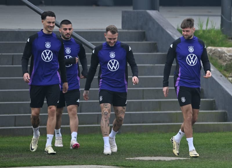 (L-R) German national team players Robin Koch, Deniz Undav, David Raum and Niclas Fuellkrug take part in a training session at DFB Campus ahead of the friendly matches against France. Arne Dedert/dpa