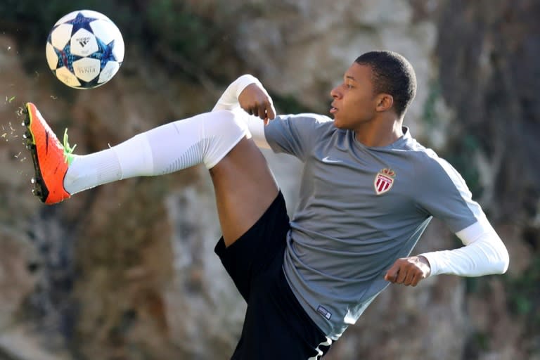 Monaco forward Kylian Mbappe controls the ball during a training session at the Louis II Stadium in Monaco on March 14, 2017, the eve of their Champions League match against Manchester City