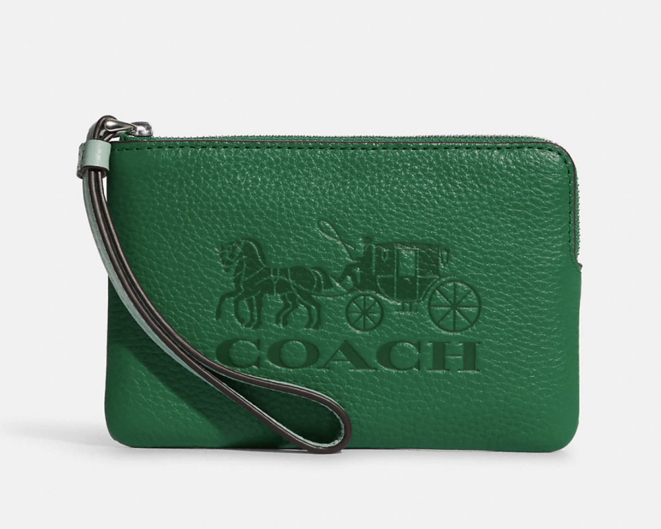 Corner Zip Wristlet in green (Photo via Coach Outlet)