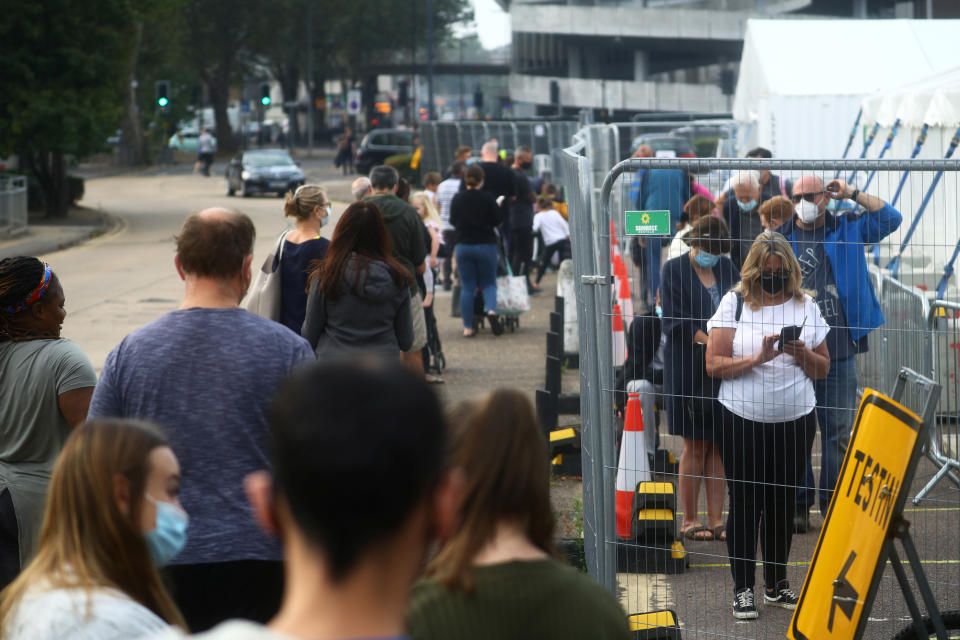 People queue at a test centre following an outbreak of the coronavirus disease (COVID-19) in Southend-on-sea, Britain September 16, 2020.  REUTERS/Hannah McKay