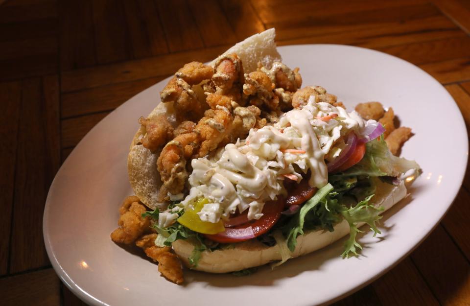 A fully dressed Crawfish Po'Boy is a mouthful at The French Quarter in Rochester.