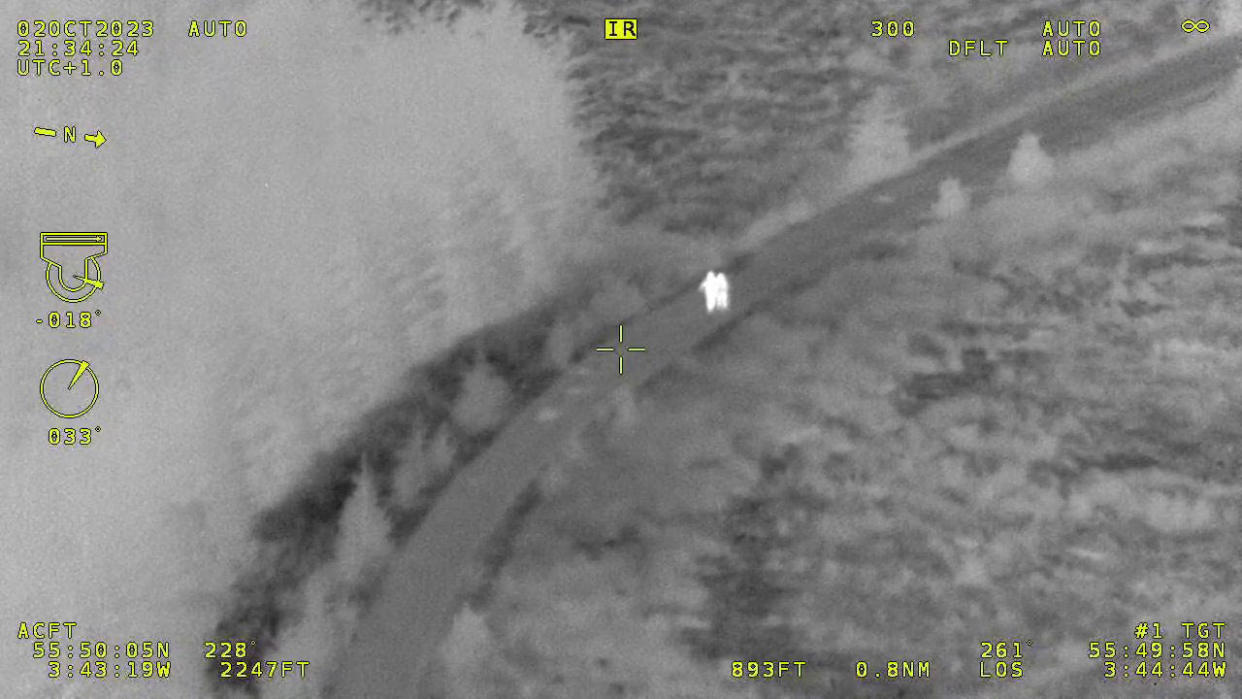  Thermal image of two children lost in Scottish forest with metadata around it. 