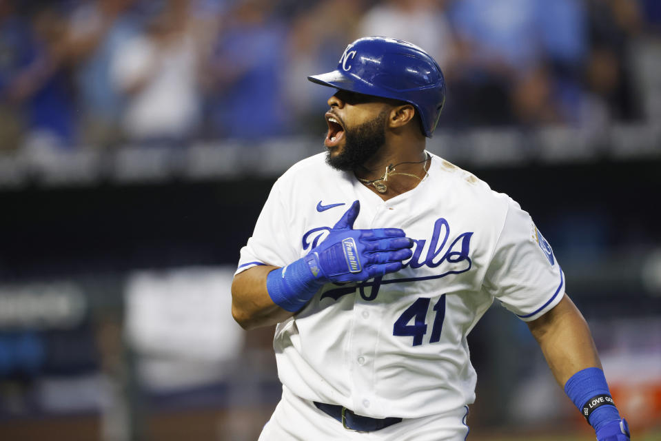 Kansas City Royals' Carlos Santana reacts toward his team's dugout after hitting a go-ahead three-run home run in the seventh inning of a baseball game against the Detroit Tigers at Kauffman Stadium in Kansas City, Mo., Saturday, July 24, 2021. (AP Photo/Colin E. Braley)