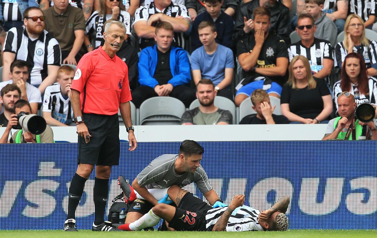 DeAndre Yedlin was injured in the 90th minute of Newcastle’s Premier League opener against Tottenham. (Getty)