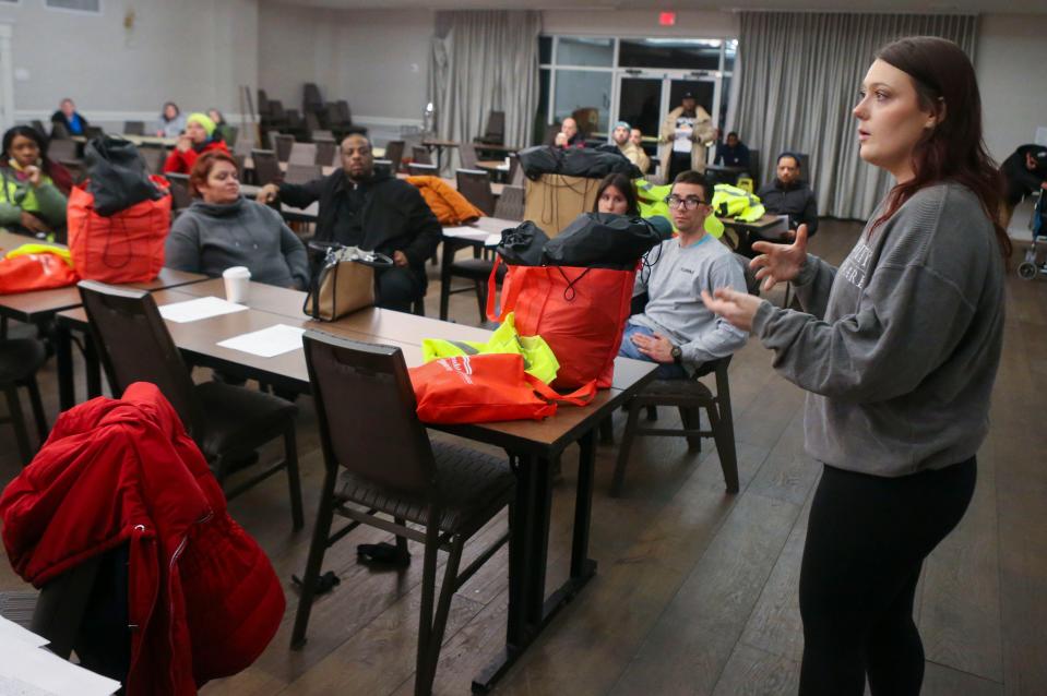 Erin Gallaher of Housing Alliance Delaware gives instructions to volunteers getting set to take part in a count of people experiencing homelessness before the groups departed from the New Castle County Hope Center near New Castle, Wednesday, Jan. 24, 2024.