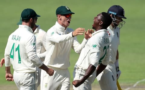 South Africa's Kagiso Rabada celebrates with teammates after taking the wicket of England's Joe Root - Credit: REUTERS