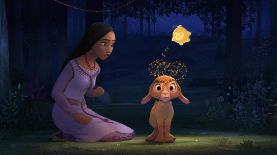Asha watches on as Valentino is covered in Star's power in Disney's Wish