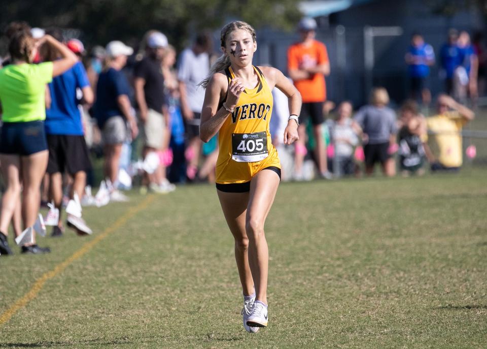 Mackenzie De Lisle of Bishop Verot comes up to the finish in second place at the 2A Region 3 Cross Country Championships on Thursday, Nov. 9, 2023, at Buckingham Community Park in Fort Myers. The Bishop Verot girls team tied for first place with Berkeley Prep in the meet, with the tie-breaker going to Berkeley Prep.