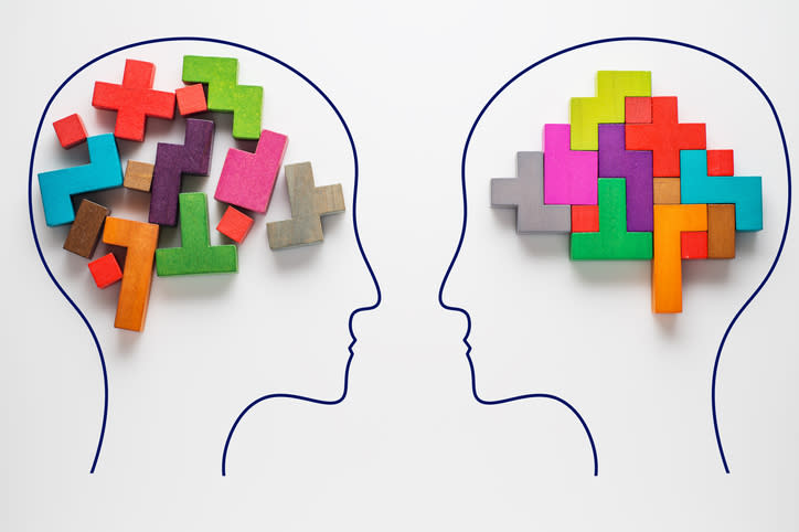 Two drawings of brains represented by colorful blocks, with one jumbled and the other orderly.